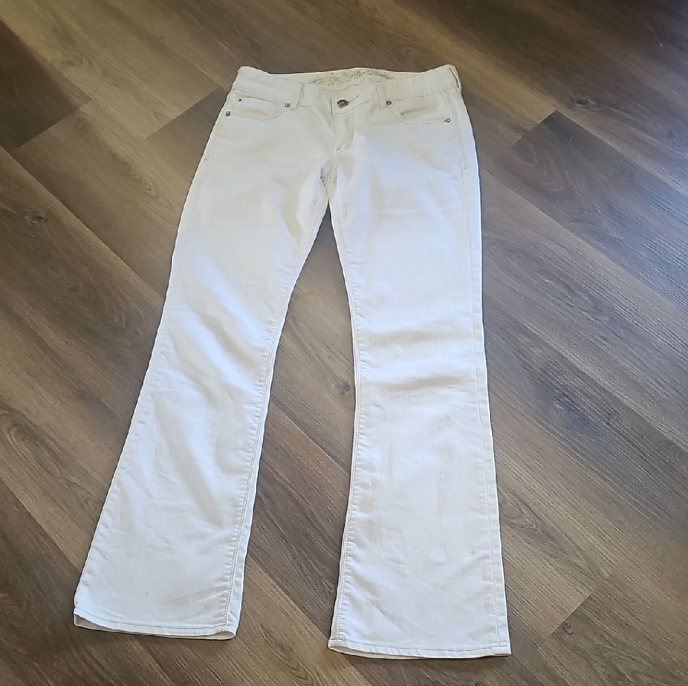 White Low Rise Boot Cut Jeans